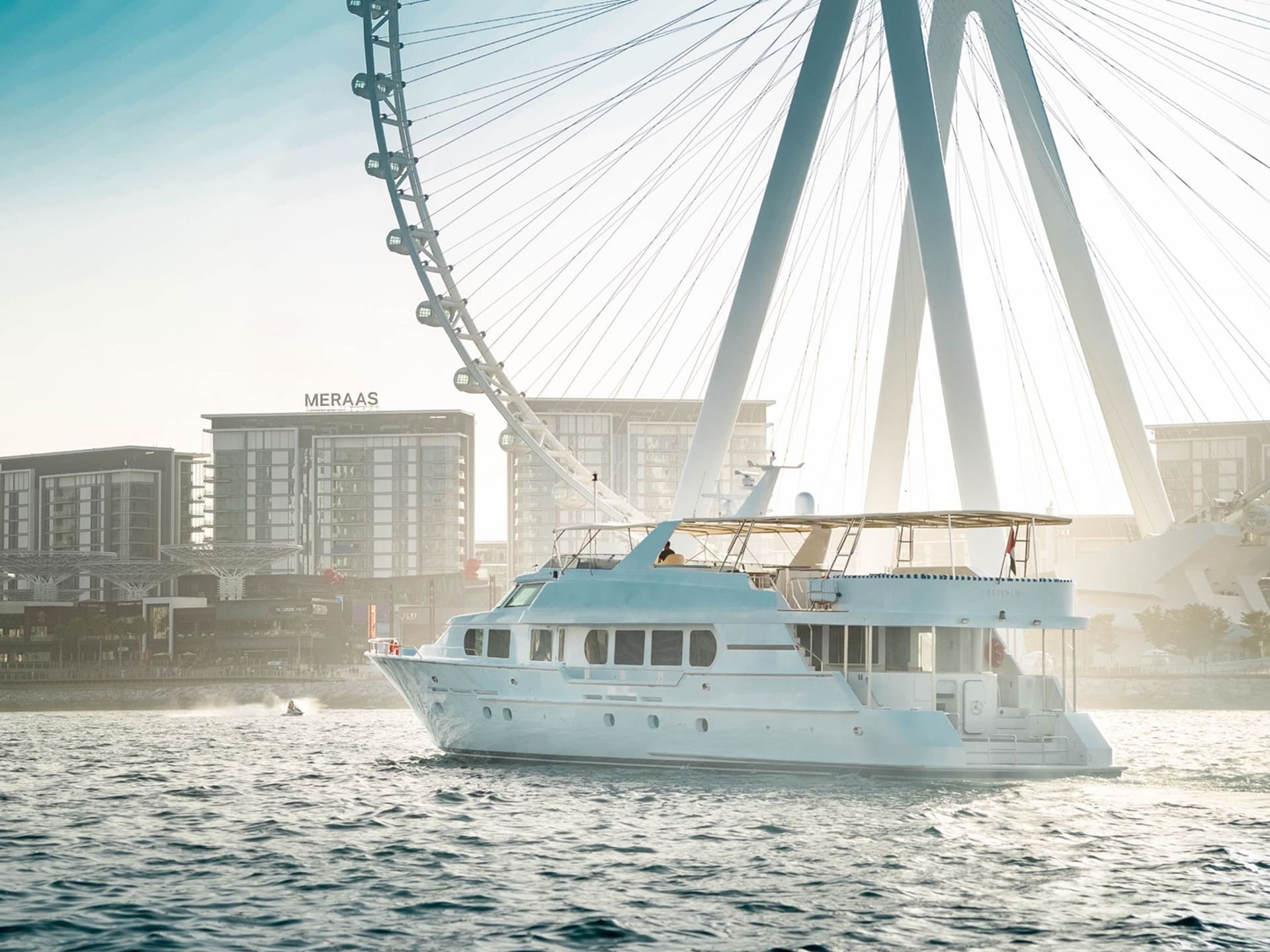 Poseidon 118ft luxury yacht cruising Dubai Marina with premium services