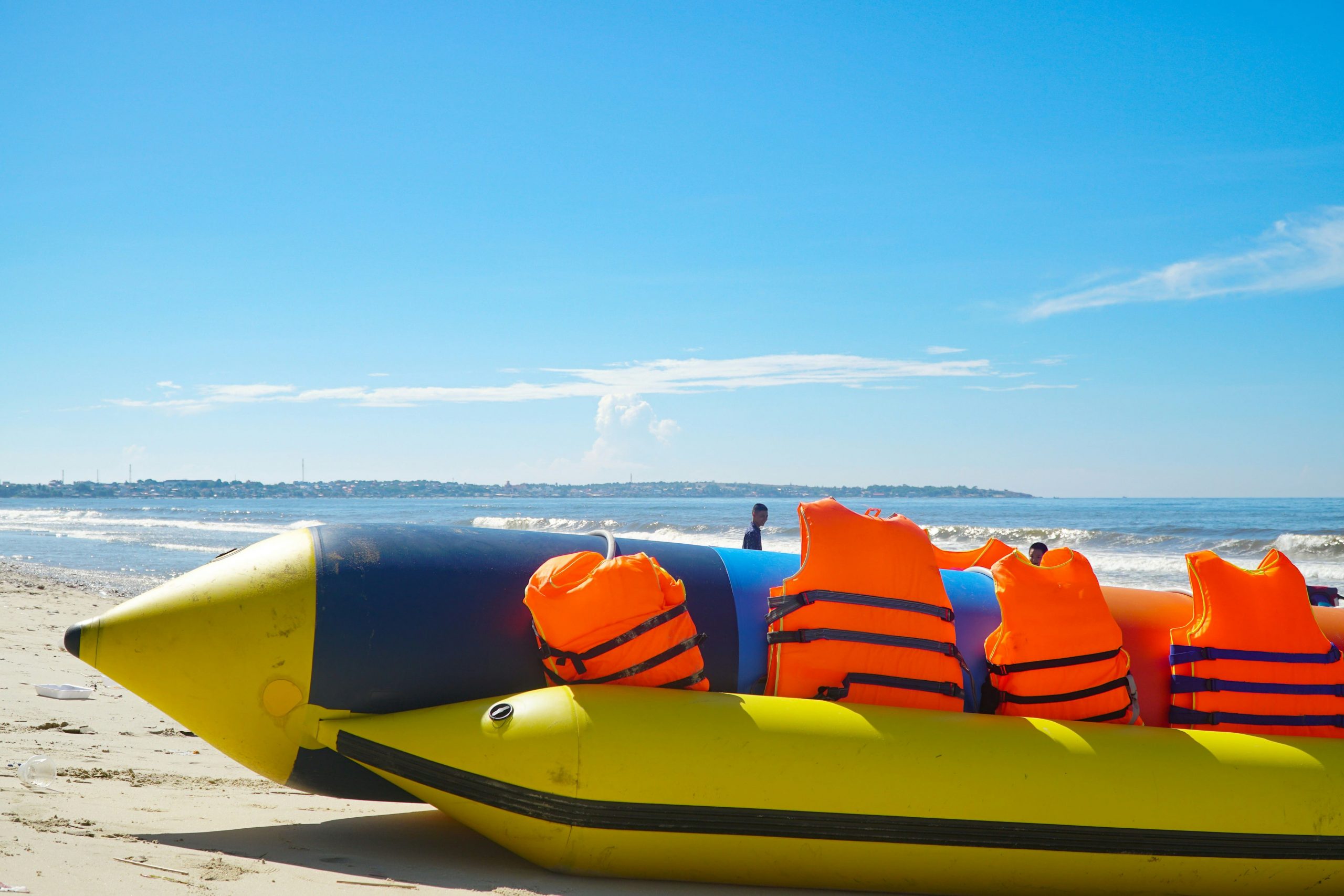 Group laughing on a banana boat rental in Dubai Marina
