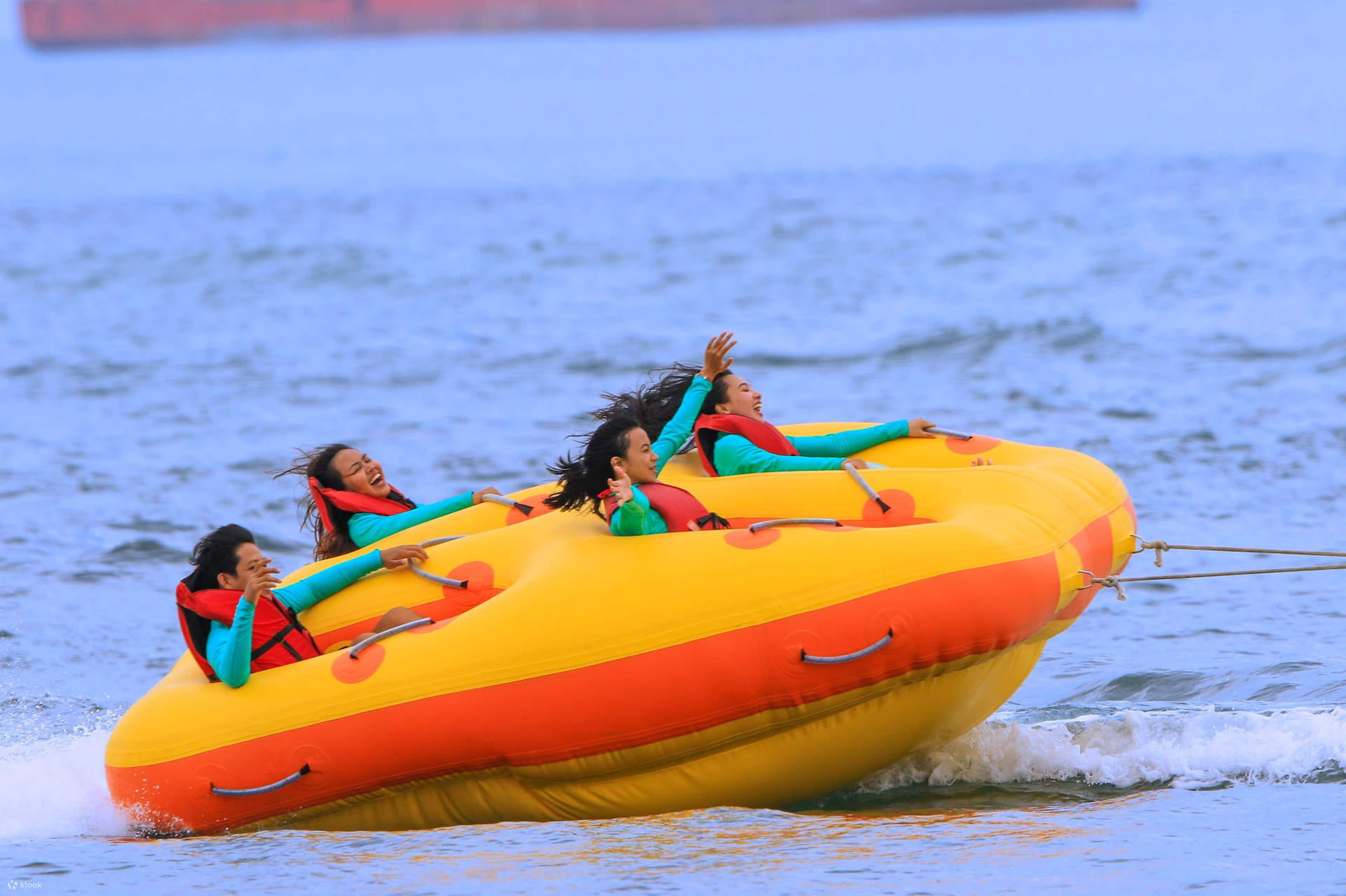 Donut ride Dubai with friends enjoying thrilling water sports