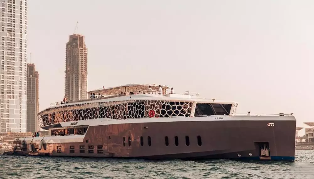 Luxury yacht brunch Dubai with gourmet food and city skyline views